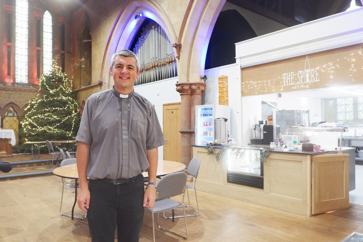Rev Steve Bunton standing in a church